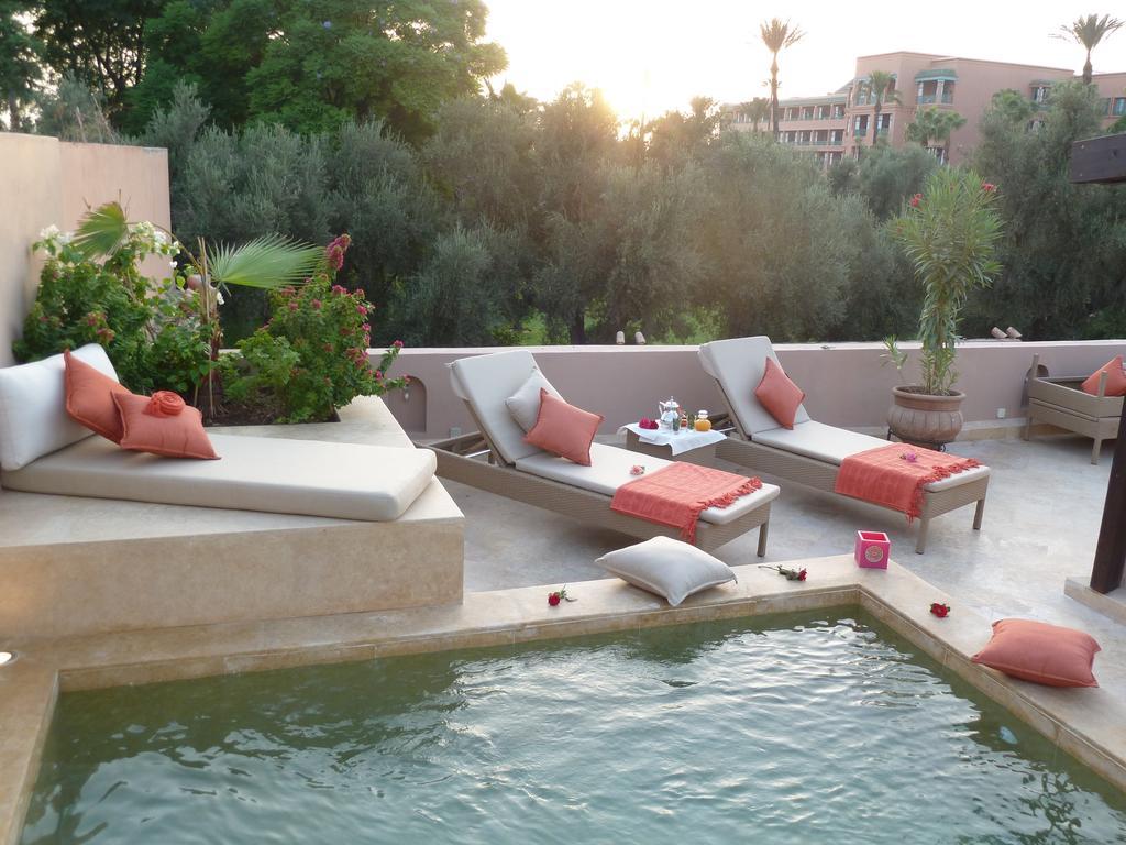 Riad Viva Marrakesh Esterno foto The swimming pool at the hotel